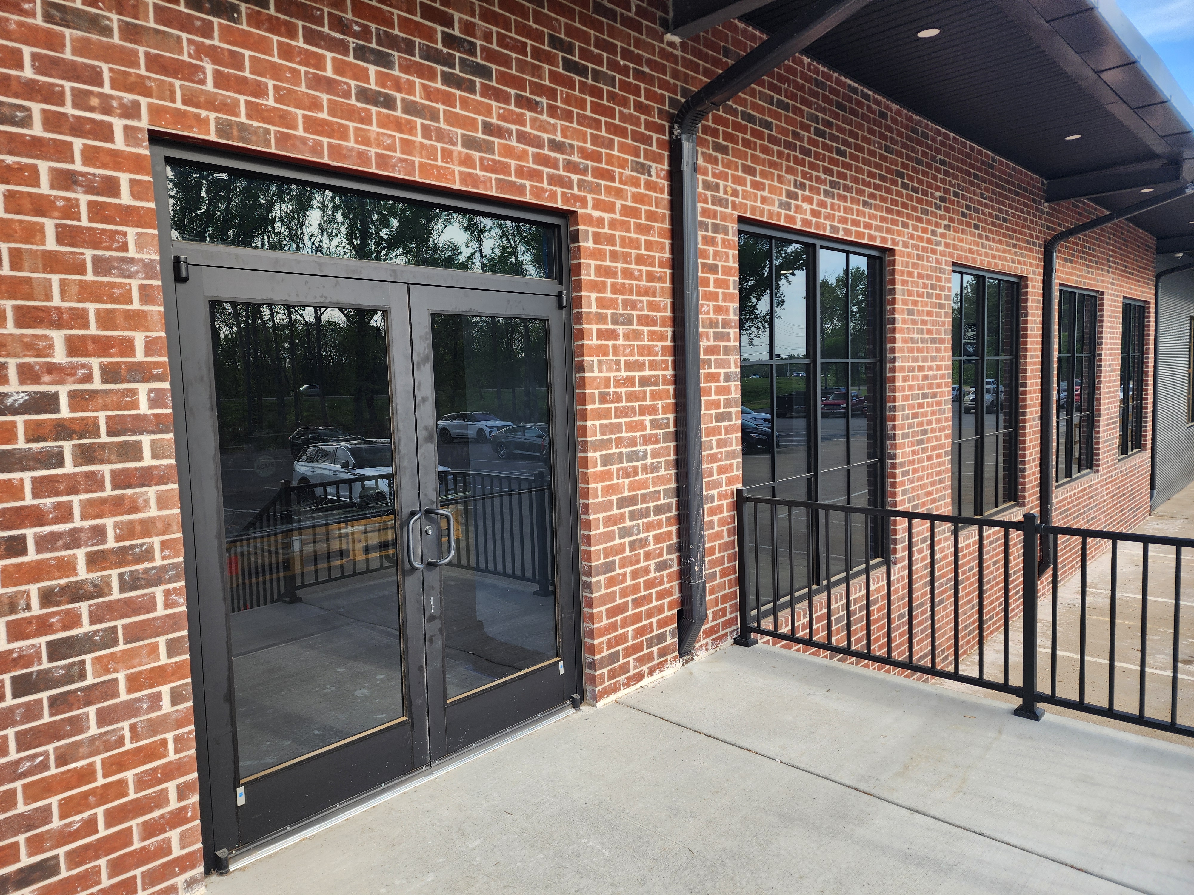 Acme Athletics commercial glass